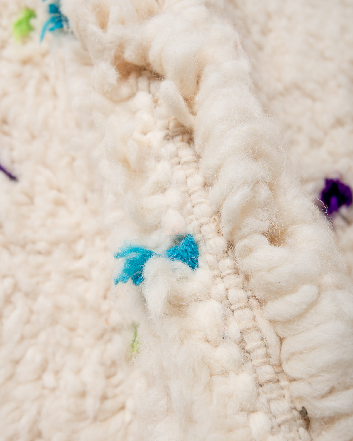 Modern, designer, handcrafted Berber rug from Morocco. Beniourain carpet with beautiful colours and patterns and fluffy wool texture.